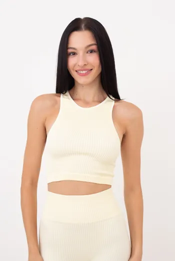 Безшовний топ в рубчик на широких бретелях Halter top rib Giulia (vanilla), жовтий Безшовний топ в рубчик на широких бретелях Halter top rib Giulia (vanilla), жовтий